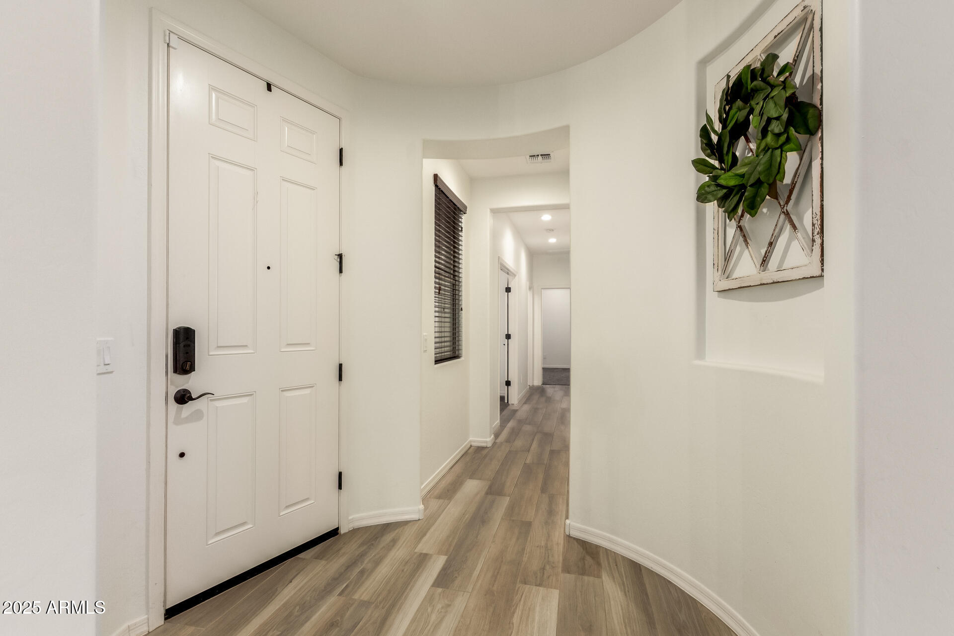 5660 South Colt Mesa, AZ 85212 - Photo 9 of 34 a view of a bathroom from a hallway