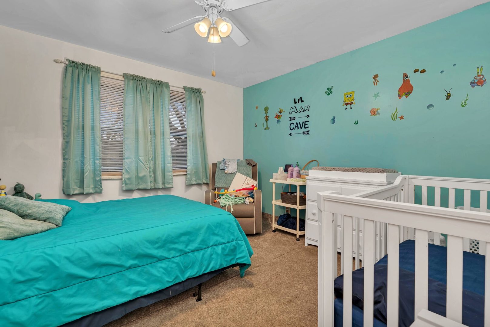 308 San Carlos Road Minooka, IL 60447 - Photo 12 of 25 a bedroom with a bed and a window