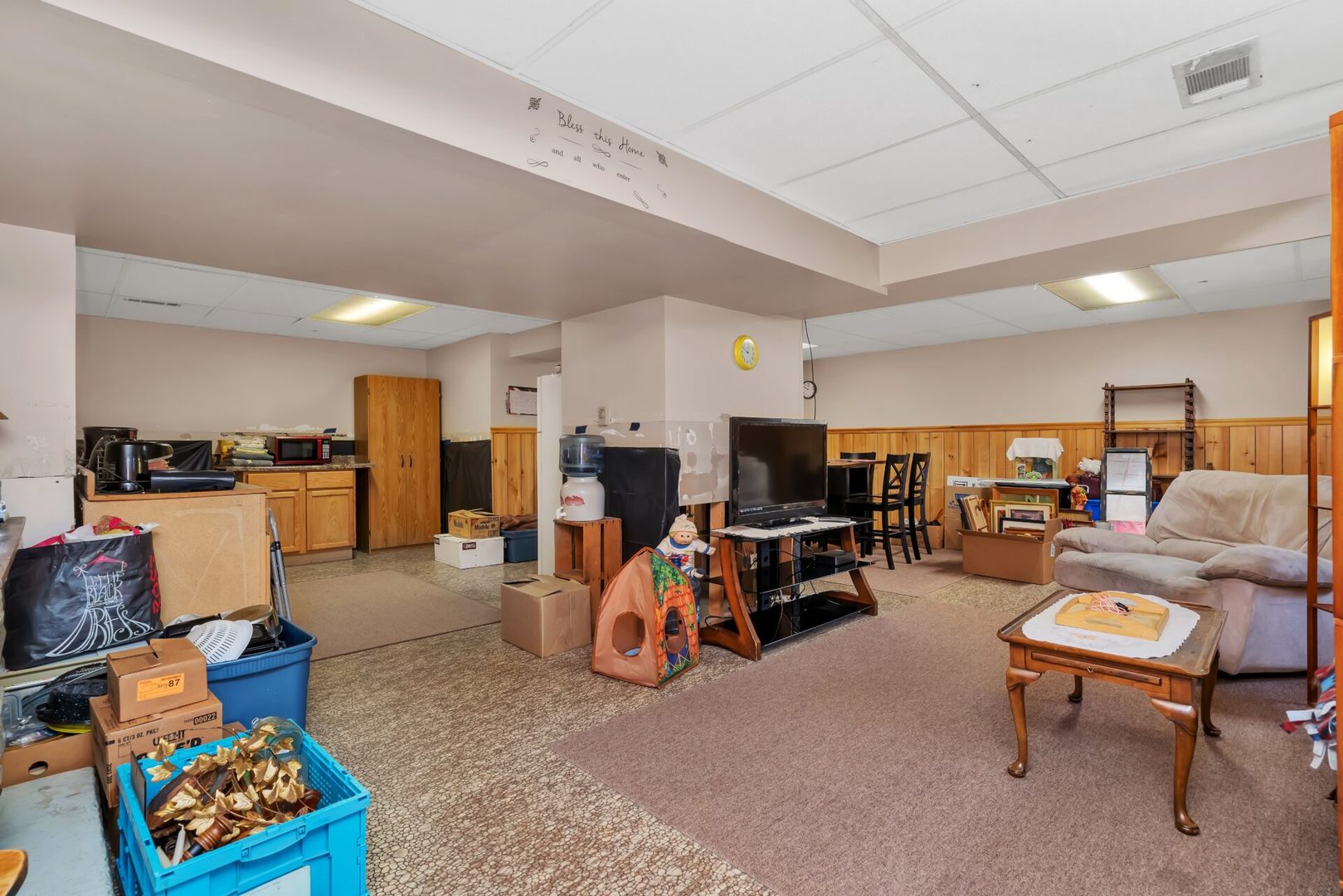 308 San Carlos Road Minooka, IL 60447 - Photo 19 of 25 a living room with furniture and a flat screen tv