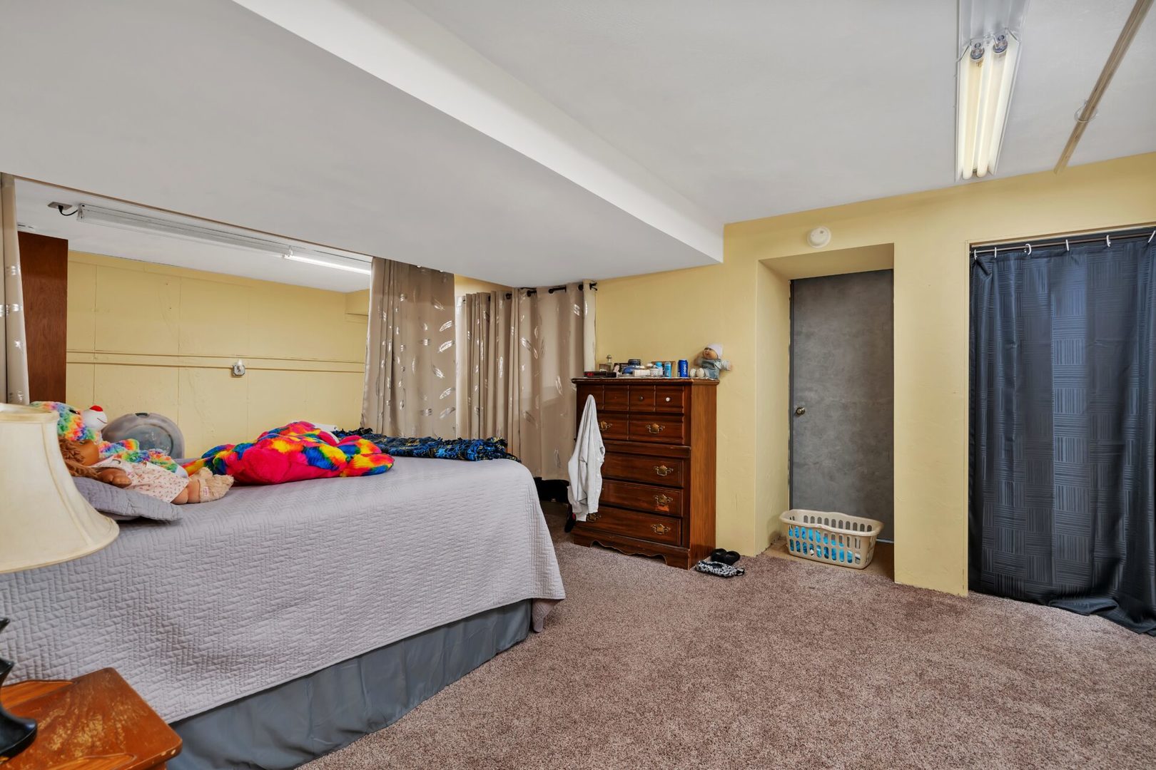 308 San Carlos Road Minooka, IL 60447 - Photo 21 of 25 a bedroom with furniture and a large window