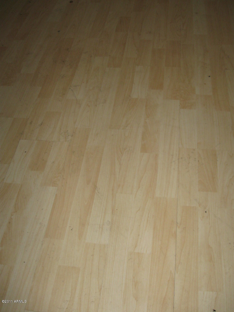 3637 West Greenway Road Phoenix, AZ 85053 - Photo 7 of 20 wood and tile floors mixed in home