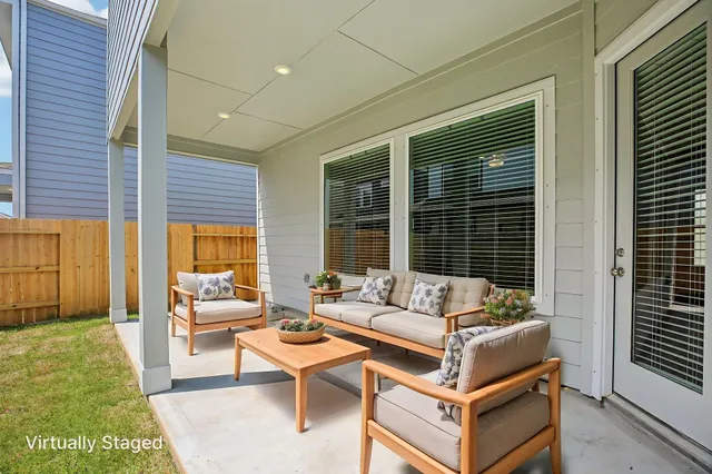 a view of a house with backyard and windows