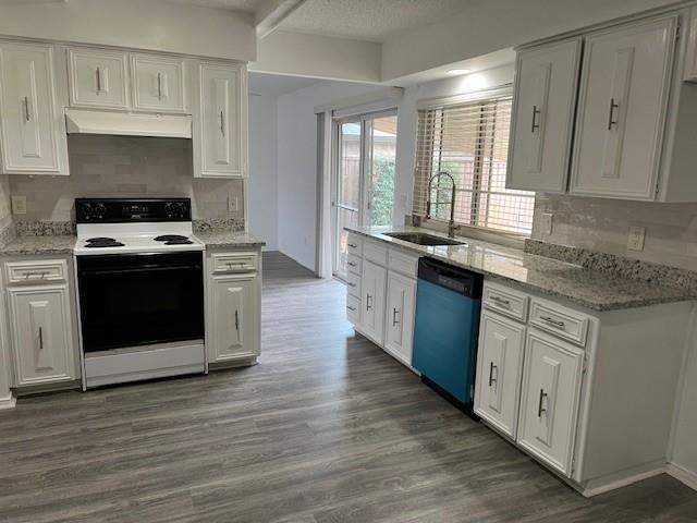 1022 Misty Way Garland, TX 75040 - Photo 11 of 15 a kitchen with stainless steel appliances granite countertop a stove a sink and a refrigerator