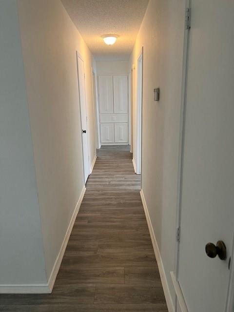 1022 Misty Way Garland, TX 75040 - Photo 13 of 15 a view of a hallway with wooden floor