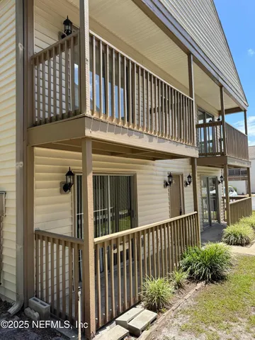 a view of a brick house with a window