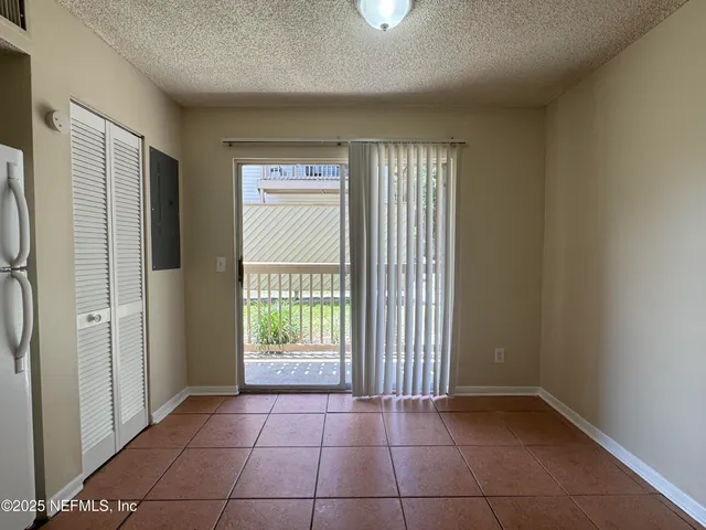 a bathroom with a toilet a sink and a mirror