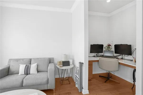 a living room with furniture and a table