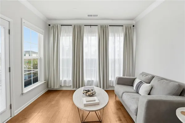 a front view of a building with many windows