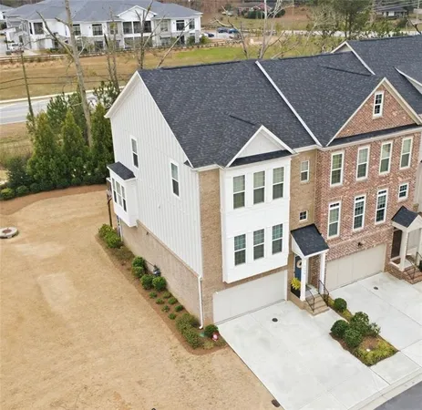a view of a white house with outdoor space