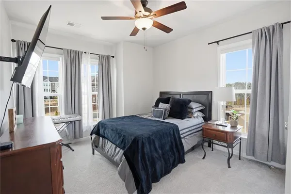 a bed room with a bed and a table