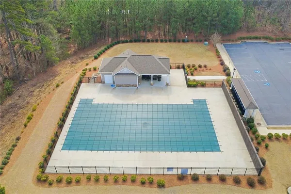 an aerial view of a house with a ocean view