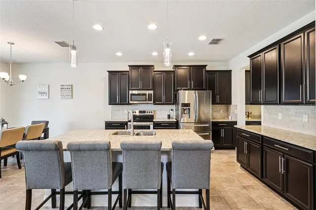 $598,880 | 1833 Benoit Terrace, Davenport, FL 33837