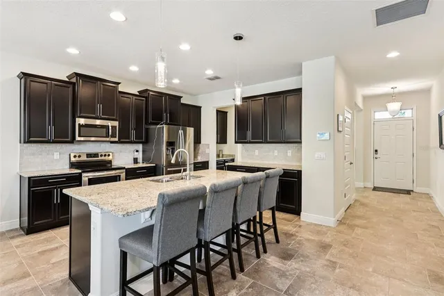 $598,880 | 1833 Benoit Terrace, Davenport, FL 33837