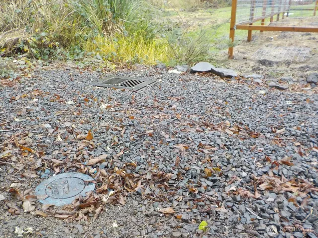a view of a backyard of a house