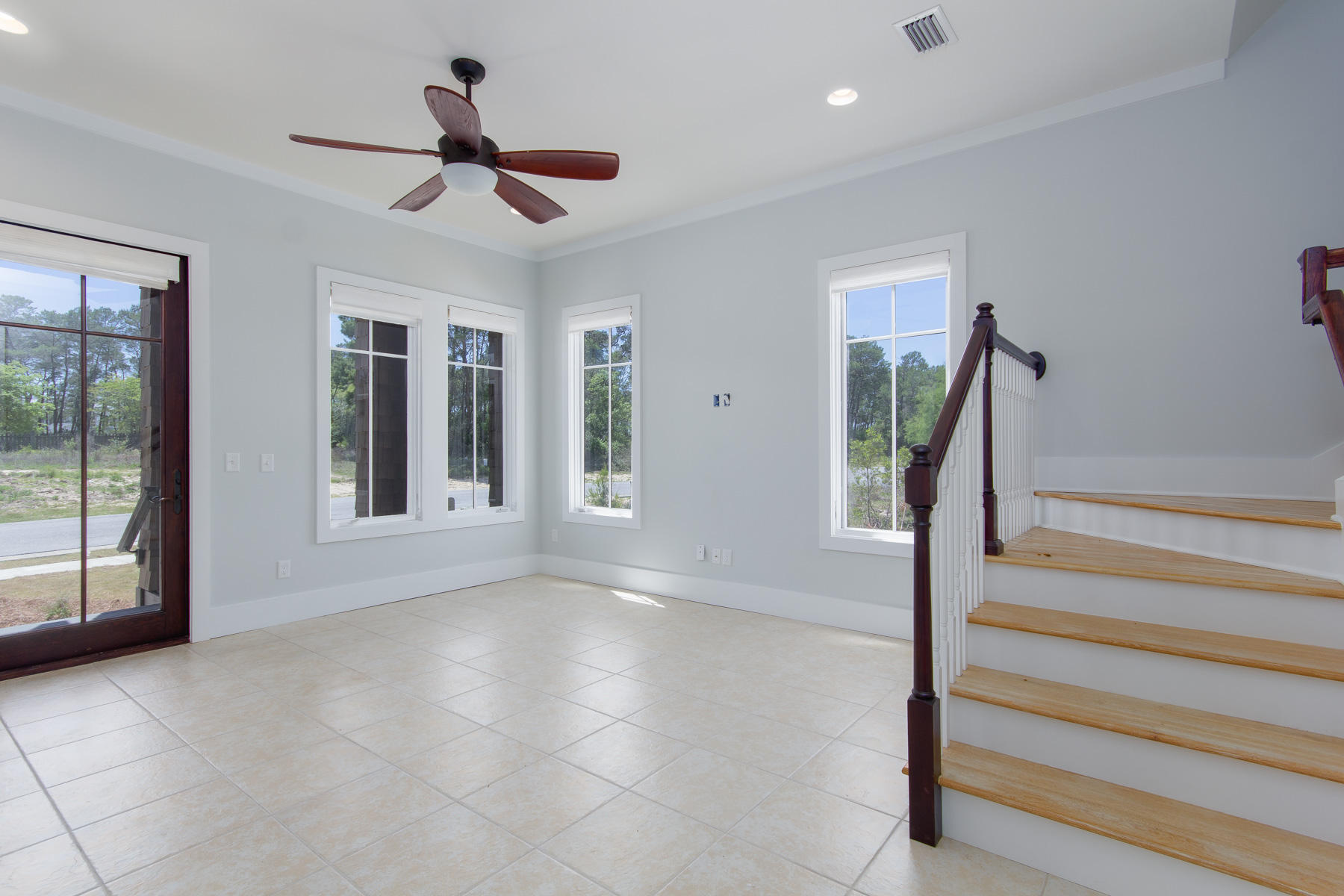 62 West Willow Mist Rd Inlet Beach Inlet Beach, FL 32461 - Photo 14 of 30 a view of empty room with stairs and fan