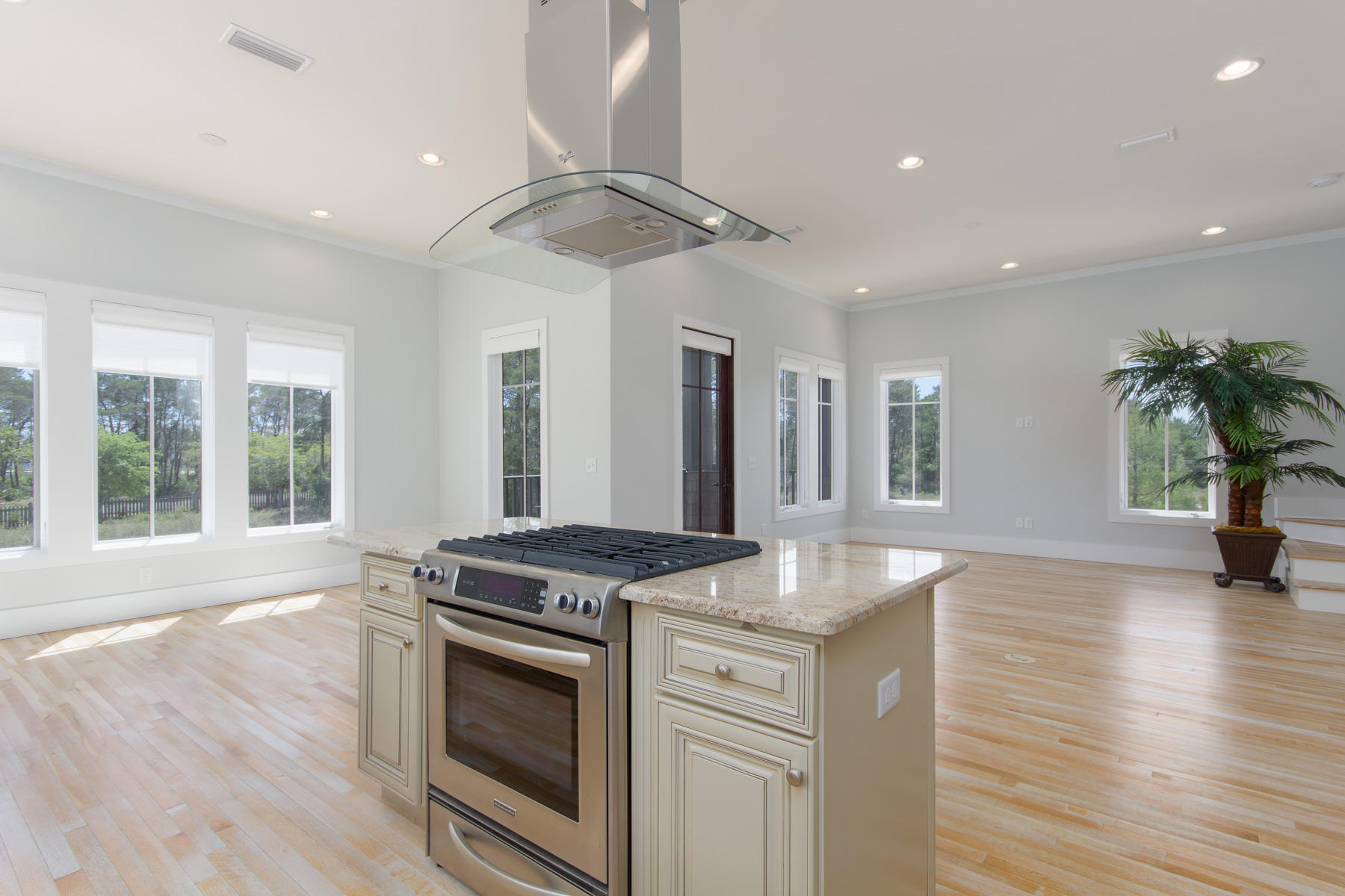 62 West Willow Mist Rd Inlet Beach Inlet Beach, FL 32461 - Photo 17 of 30 a kitchen with stainless steel appliances granite countertop a stove and a wooden floors