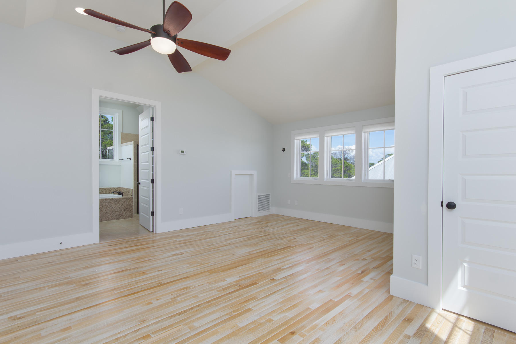 62 West Willow Mist Rd Inlet Beach Inlet Beach, FL 32461 - Photo 23 of 30 an empty room with wooden floor a ceiling fan and closet