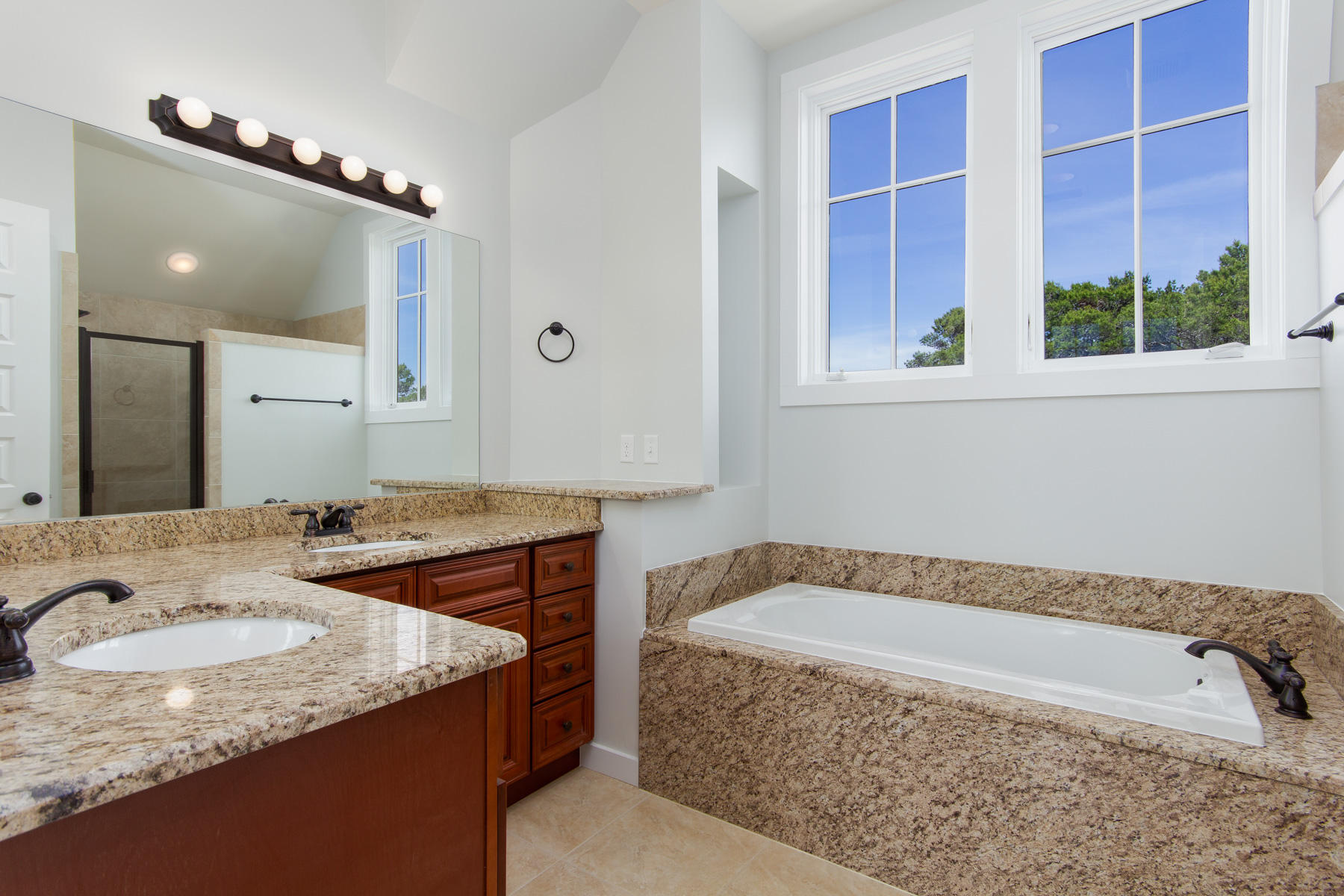 62 West Willow Mist Rd Inlet Beach Inlet Beach, FL 32461 - Photo 24 of 30 a bathroom with a granite countertop bathtub and a sink