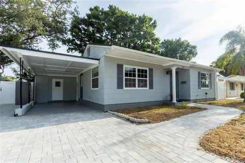 a front view of a house with a garage