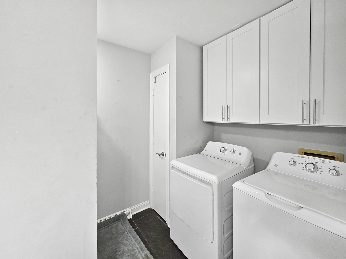934 Vilmin Road Plano, IL 60545 - Photo 13 of 24 a view of storage and utility room with washer and dryer