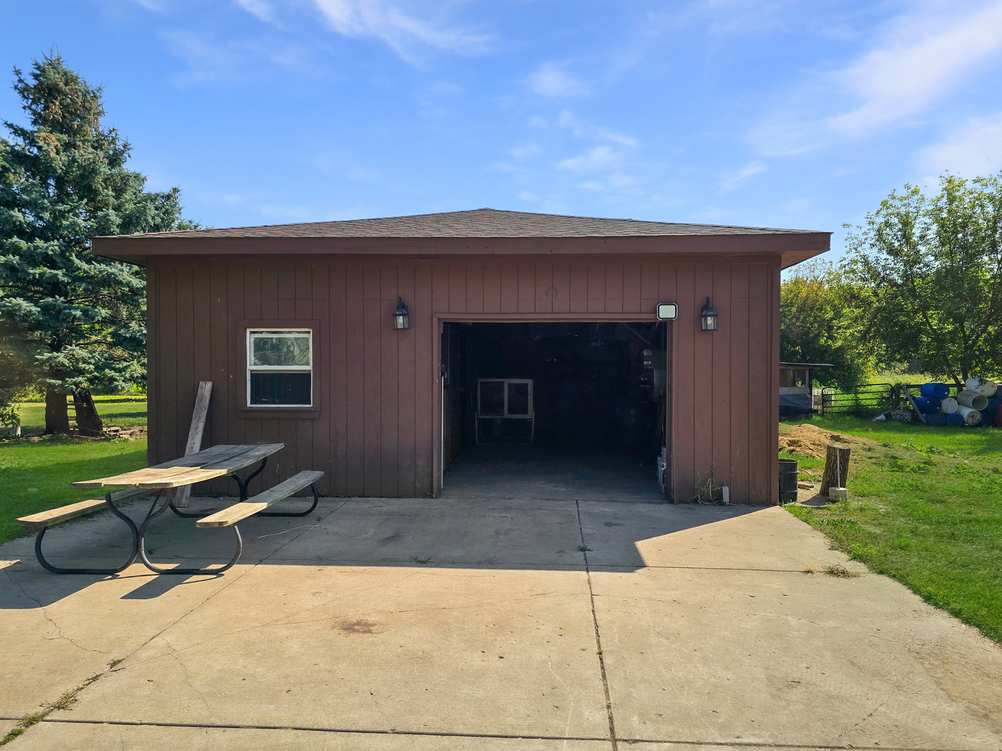 934 Vilmin Road Plano, IL 60545 - Photo 22 of 24 a view of a house with a yard