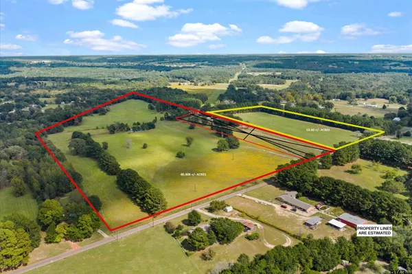 a view of a lake with a yard