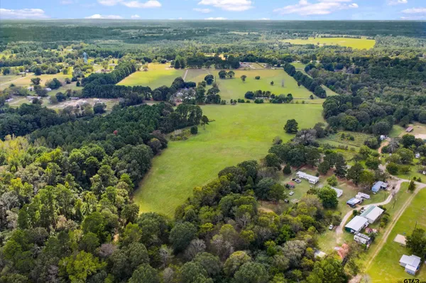 a view of a lake from a yard