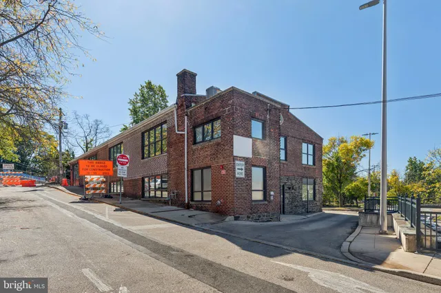 a view of a building with a street