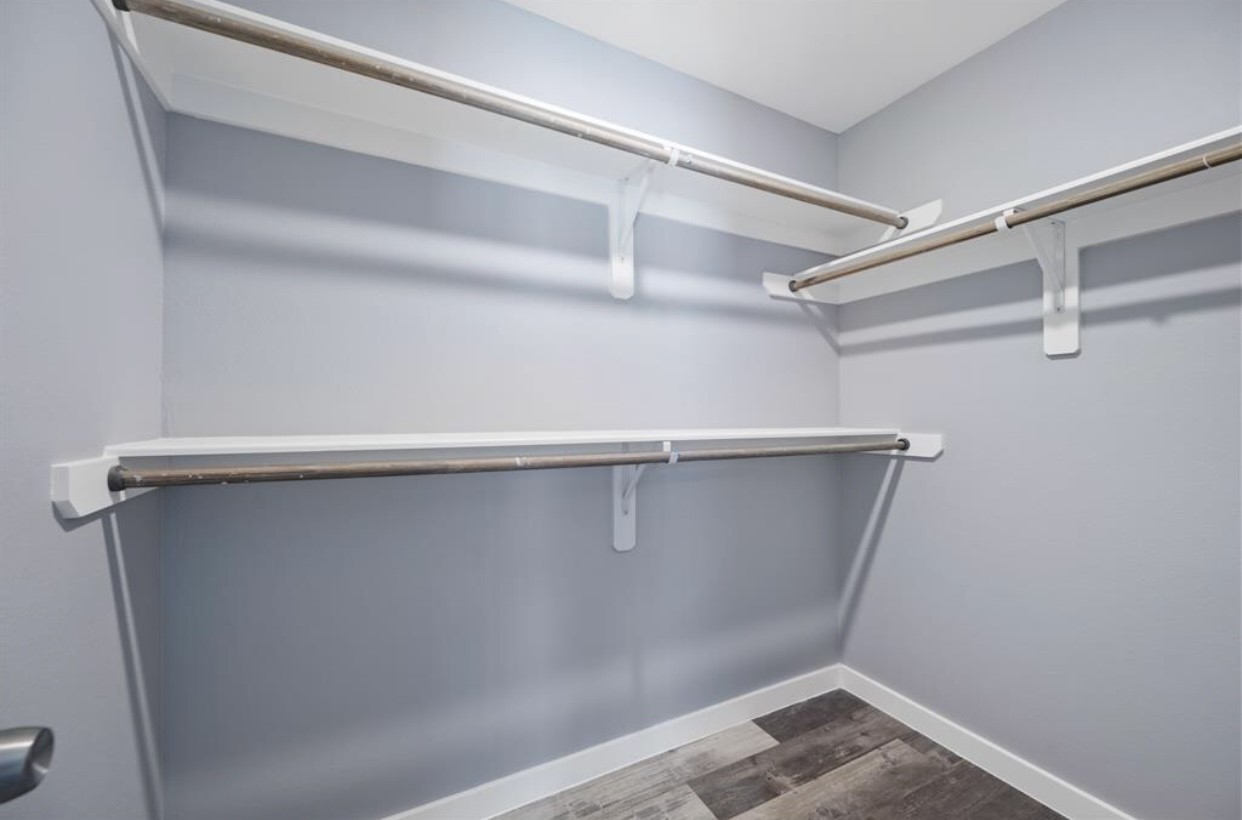 622 Maple Way Houston, TX 77015 - Photo 18 of 19 a view of an empty walk in closet