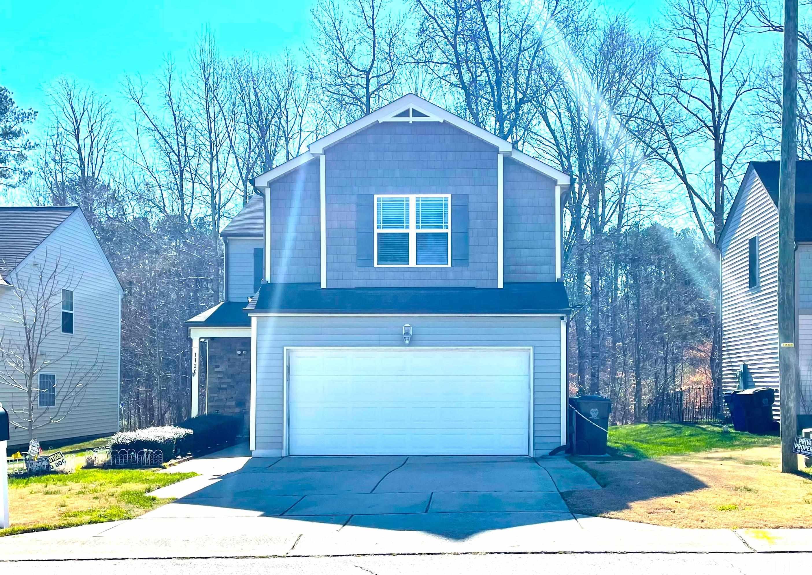 1120 Early Rise Street Raleigh, NC 27610 - Photo 1 of 33 a front view of a house with garden