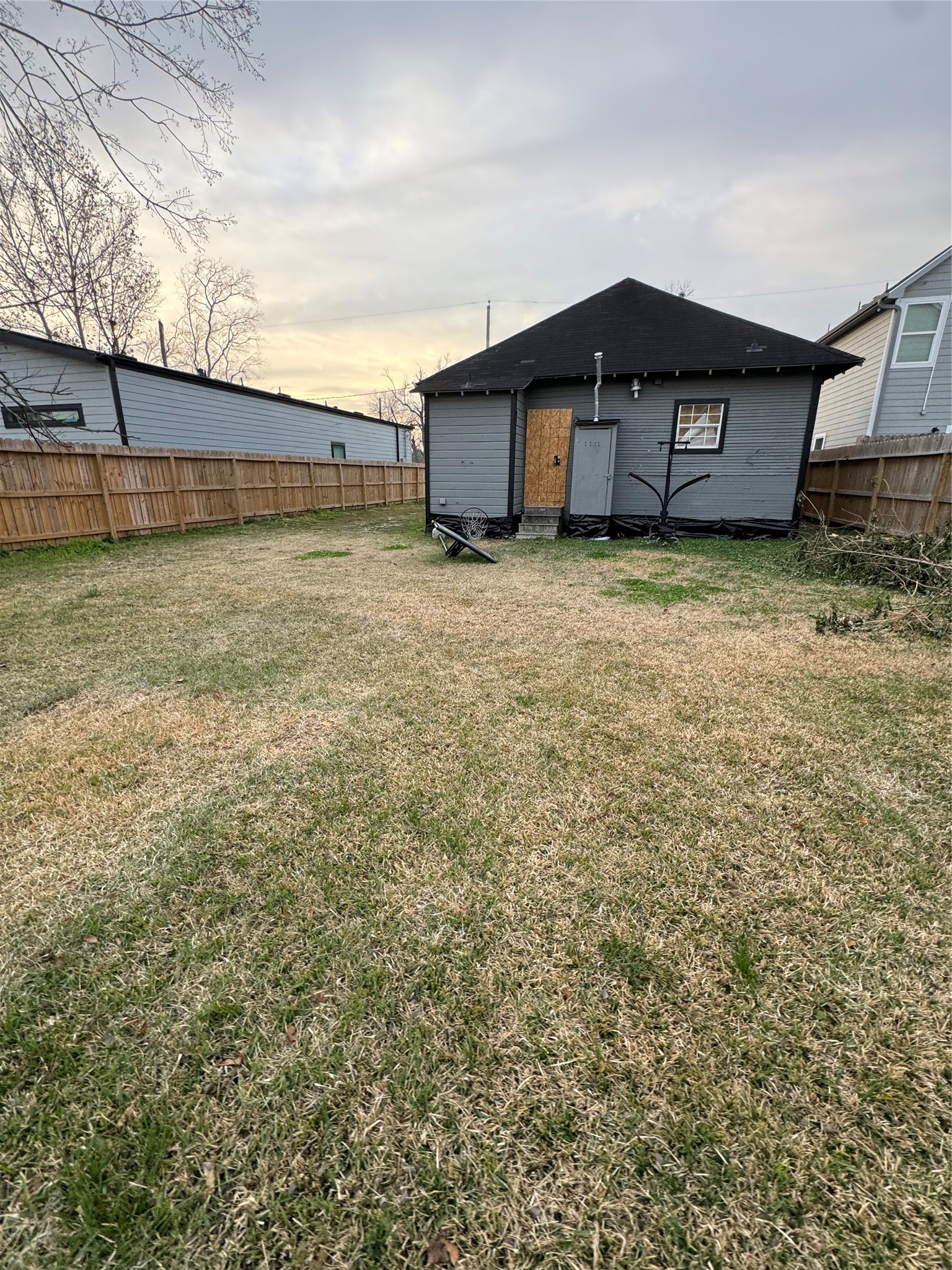 4013 King Street Houston, TX 77026 - Photo 5 of 8 a view of a house with a wooden fence
