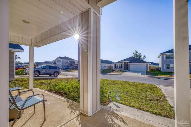 a view of a patio with garden