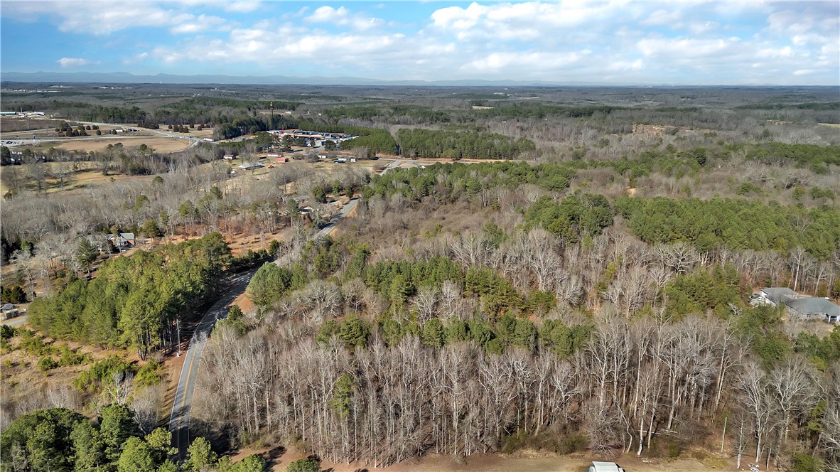 1106 Bay Drive Fair Play, SC 29643 - Photo 4 of 7 This elevated view captures expansive wooded terrain, perfect for a private estate.