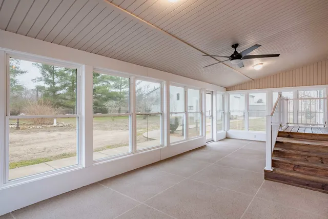 a view of entryway with wooden floor