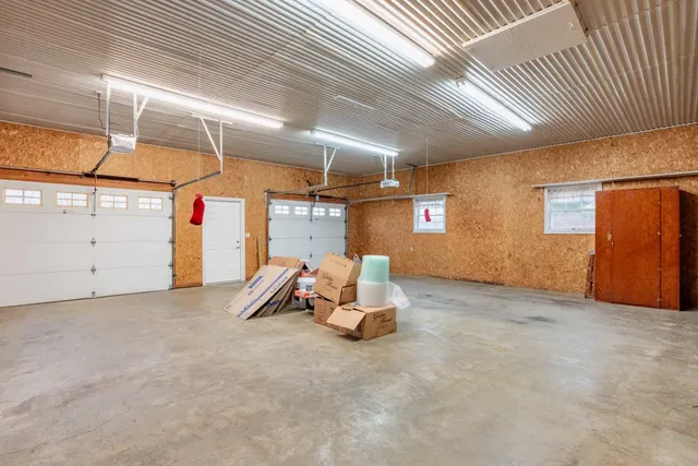 a view of a backyard with table and chair
