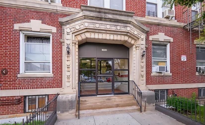 1953 65th Street, Unit 1D Brooklyn, NY 11204 - Photo 2 of 8 a view of building with a door and a chair