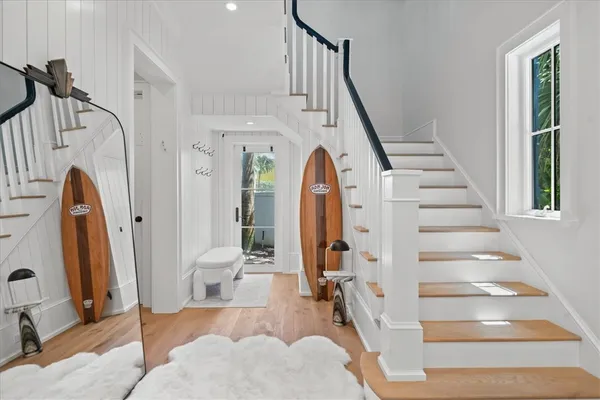 a view of a hallway with staircase