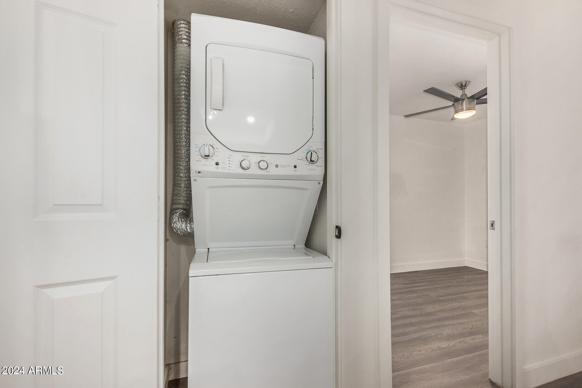 18202 Cave Creek Road, Unit 151 Phoenix, AZ 85032 - Photo 11 of 14 a view of bathroom with a toilet and a sink