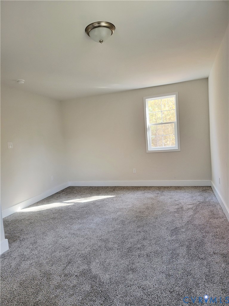 1205 Cox Road Blackstone, VA 23824 - Photo 13 of 29 an empty room with a empty space and a window