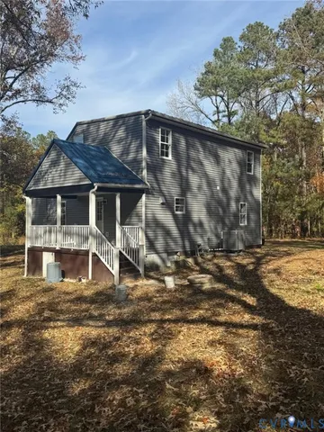 a house with trees in the background