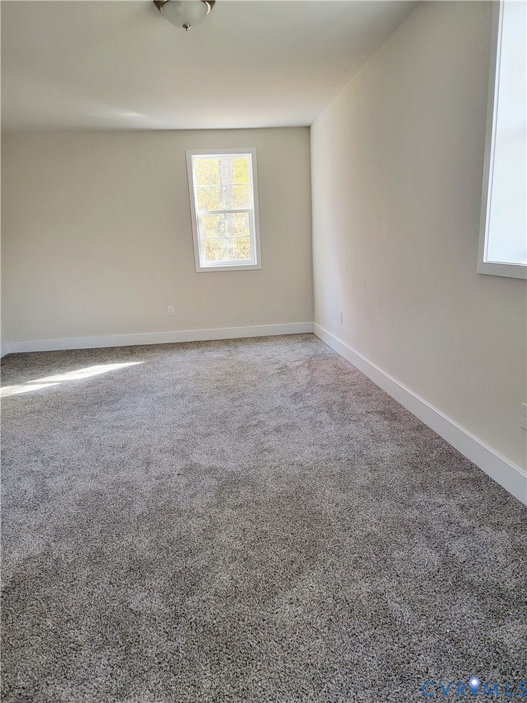 1205 Cox Road Blackstone, VA 23824 - Photo 10 of 29 an empty room with a window