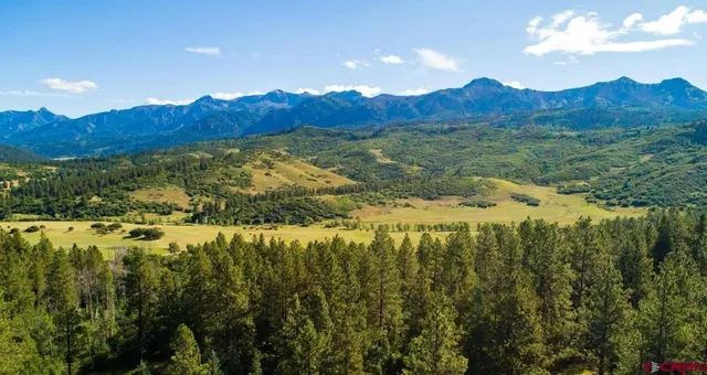 a view of mountain with lake view
