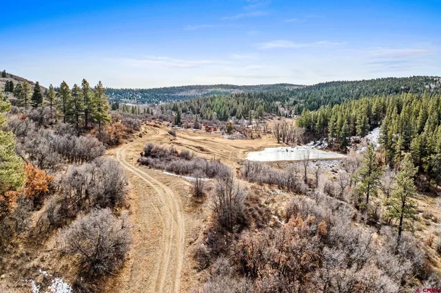 a view of a water with a building in the background