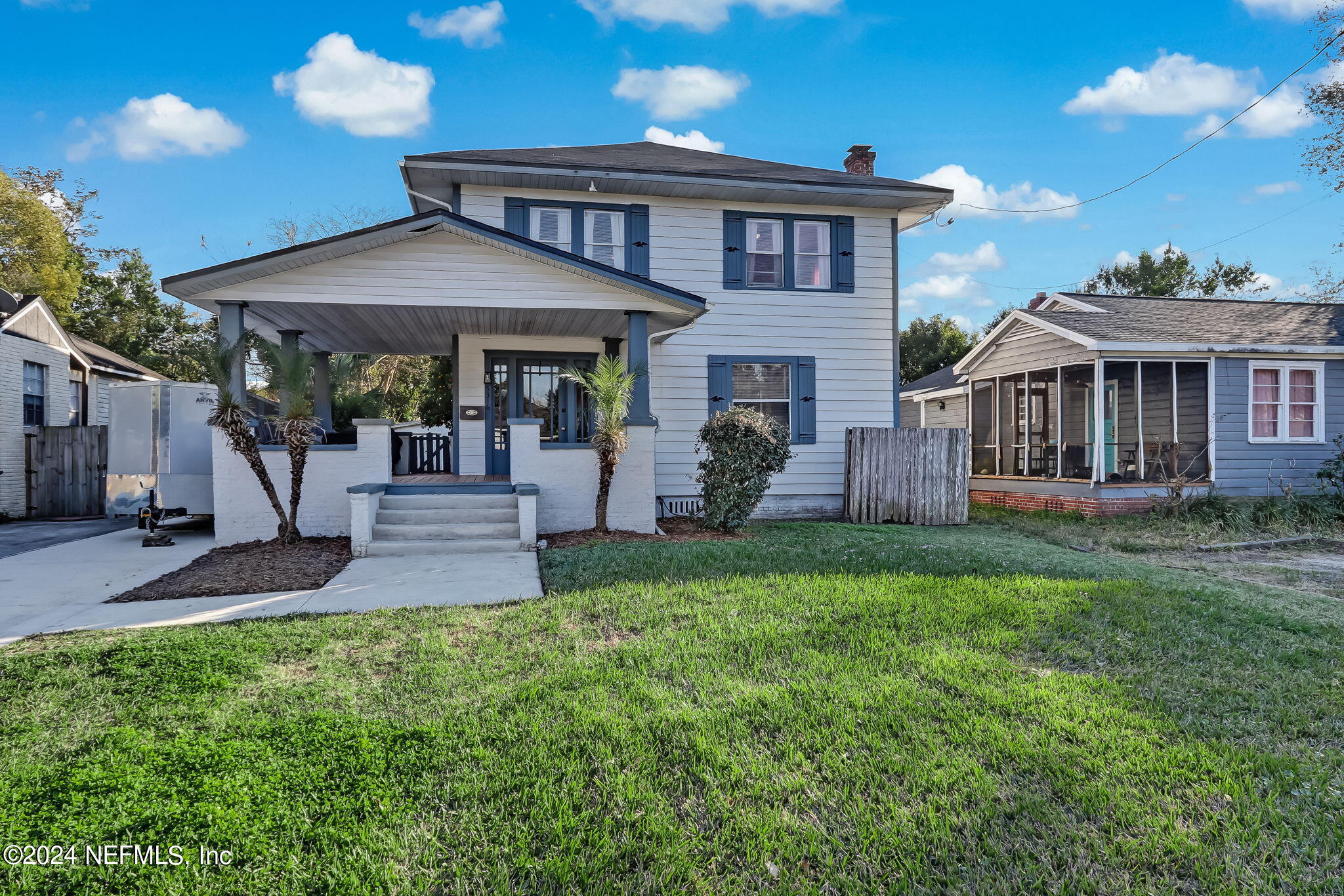 5316 Colonial Avenue Jacksonville, FL 32210 - Photo 1 of 30 a front view of a house with a yard