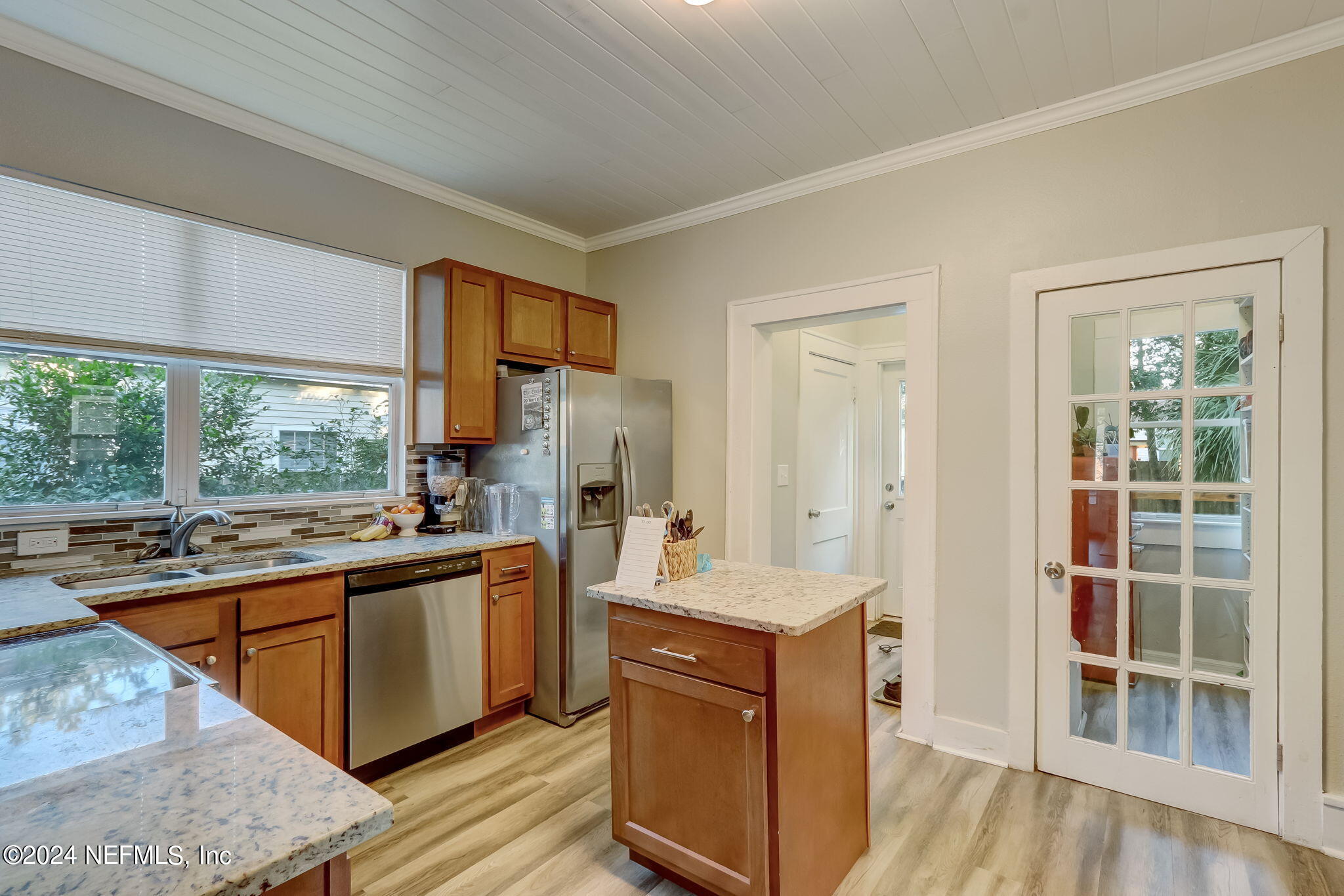 5316 Colonial Avenue Jacksonville, FL 32210 - Photo 15 of 30 a kitchen with a sink stove and cabinets