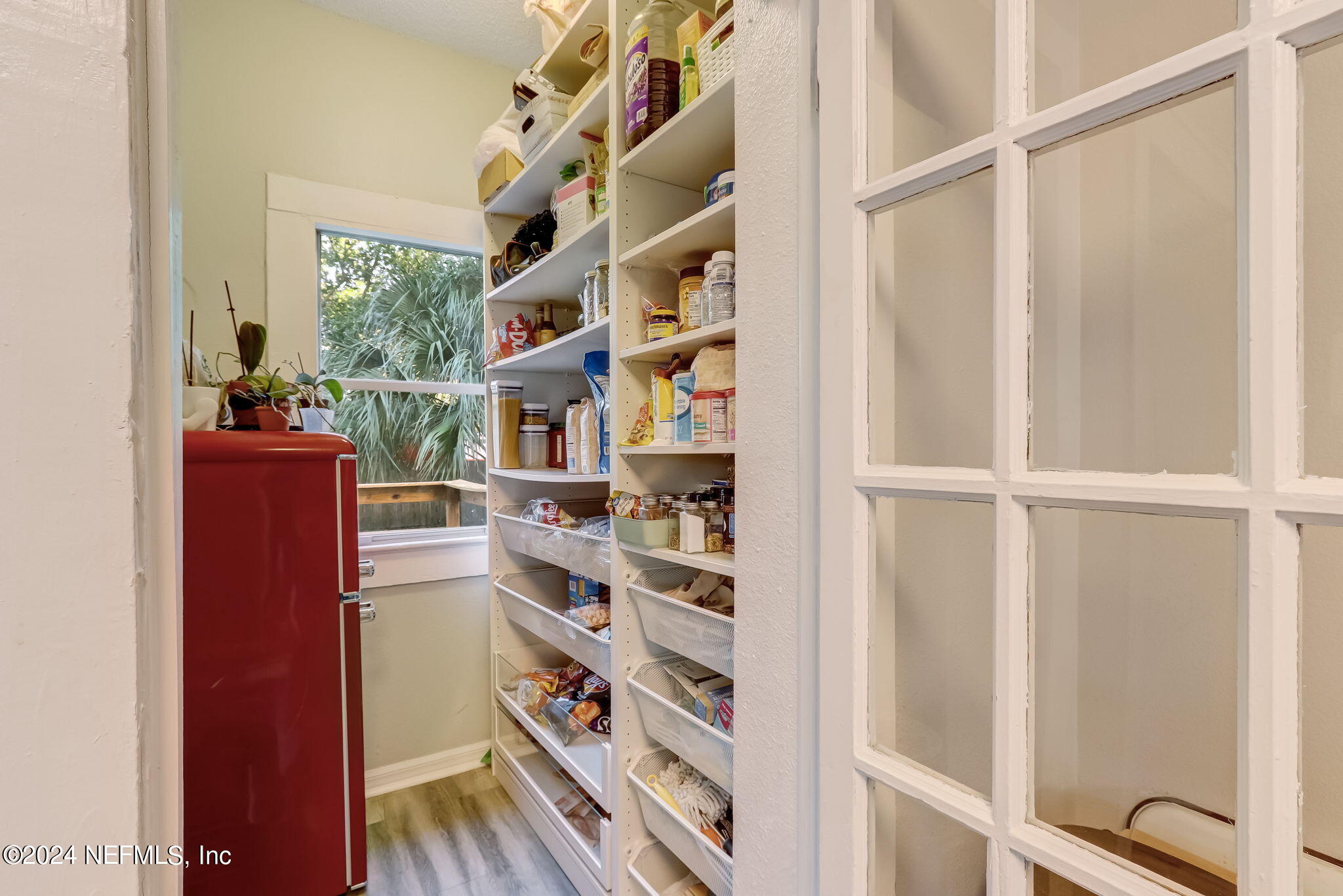 5316 Colonial Avenue Jacksonville, FL 32210 - Photo 17 of 30 a view of walk in closet with clothes and shoes