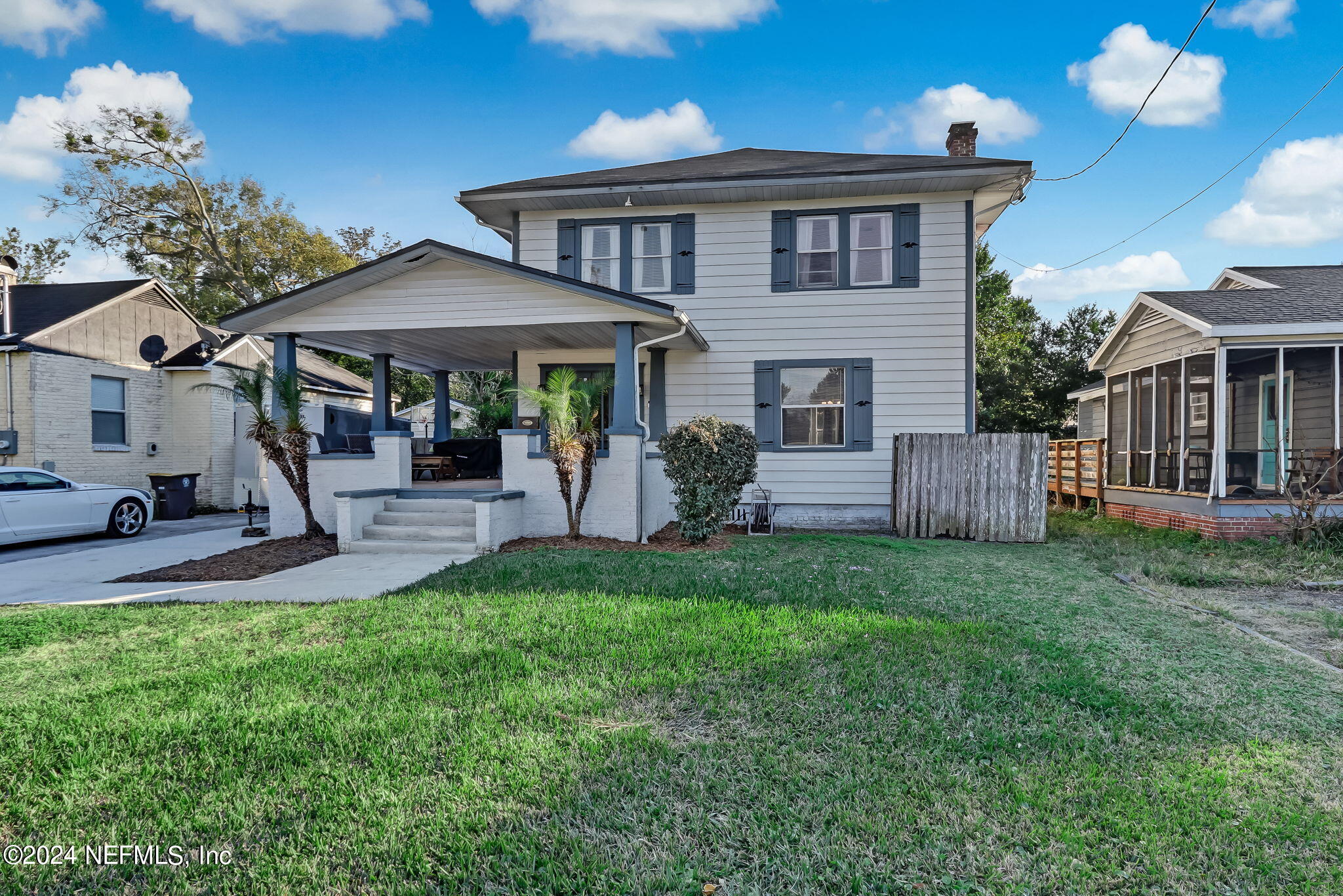 5316 Colonial Avenue Jacksonville, FL 32210 - Photo 2 of 30 a front view of a house with a garden and plants