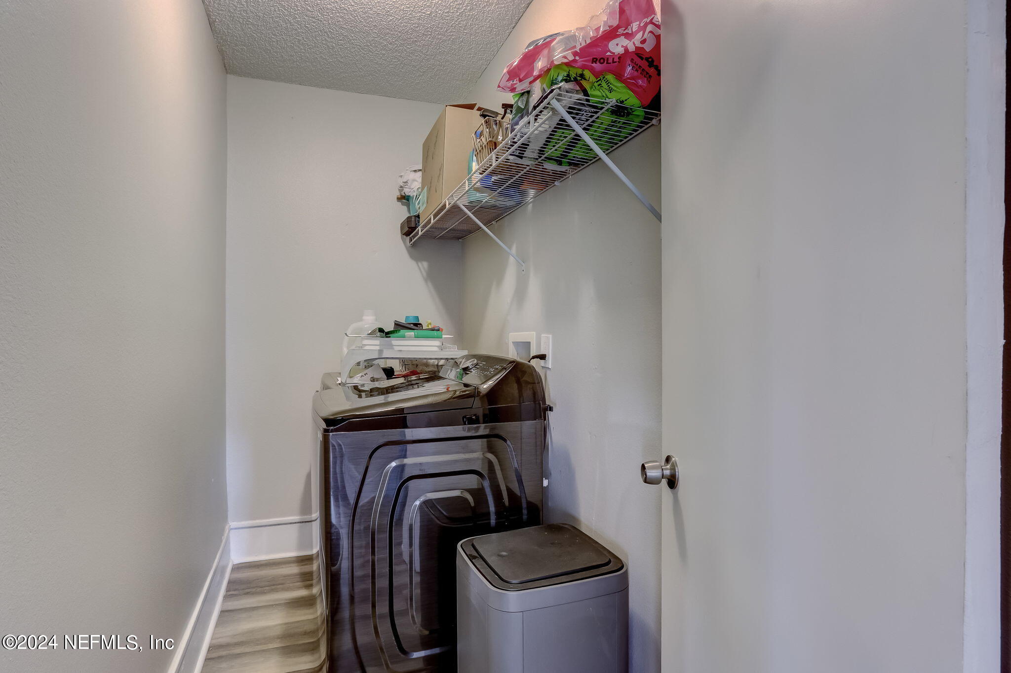 5316 Colonial Avenue Jacksonville, FL 32210 - Photo 28 of 30 a view of storage and utility room with washer and dryer