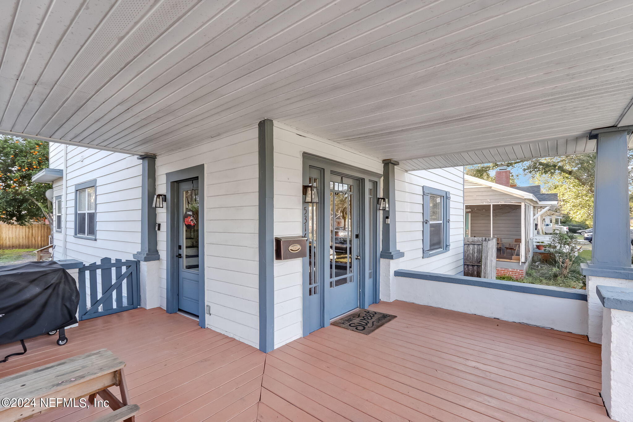 5316 Colonial Avenue Jacksonville, FL 32210 - Photo 6 of 30 a bedroom with a bed and wooden floor