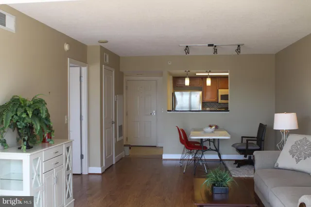 a workspace with furniture and wooden floor